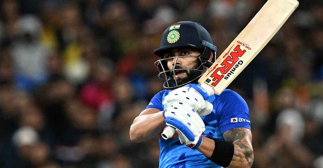 Virat Kohli plays a shot during the match against Pakistan. Photo: AFP/William West