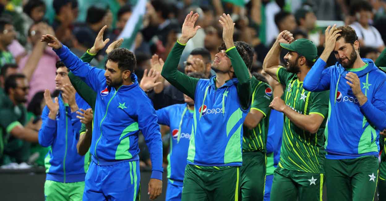 Pakistan players celebrate their win over New Zealand in the semifinal. File photo: AFP/David Gray