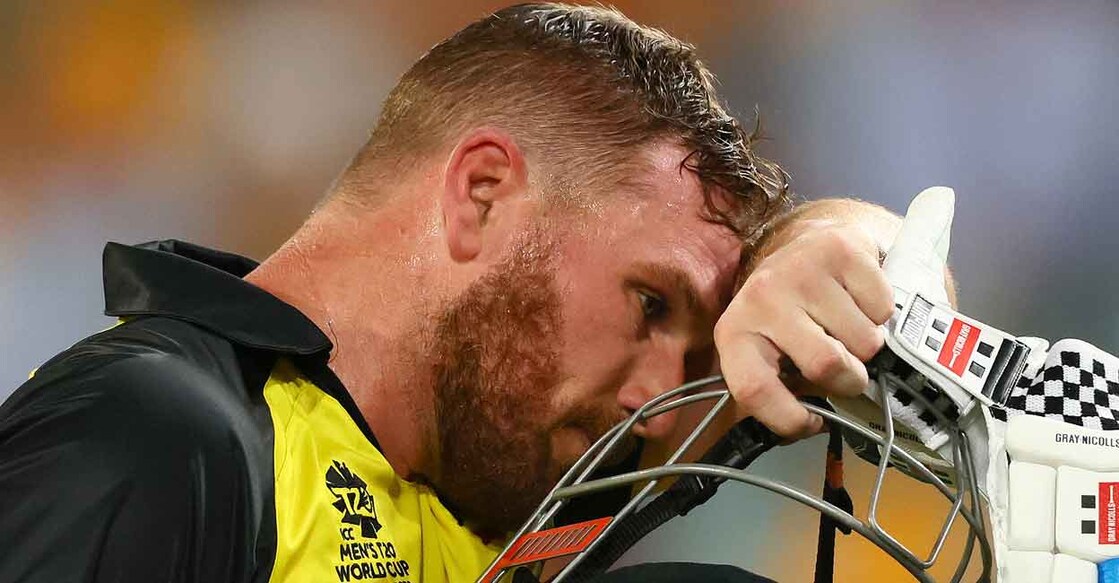 Aaron Finch walks back to the pavilion after getting out against Ireland. File photo: 
AFP/Patrick Hamilton