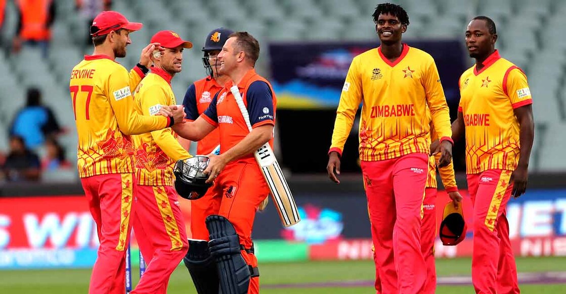 Zimbabwe players congratulate the Dutch players after the match. Photo: AFP/Surjeet Yadav