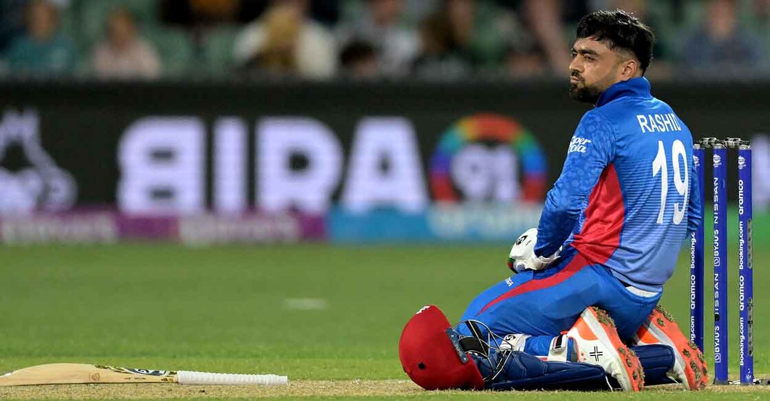 Rashid Khan's cameo was not enough to take Afghanistan to an upset win. Photo: AFP/Brenton Edwards
