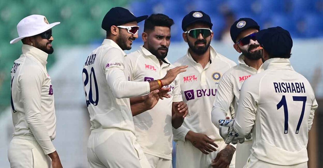 Mohammed Siraj, third left, celebrates with teammates after dismissing Najmul Hossain Shanto. Photo: AFP/Munir Uz Zaman