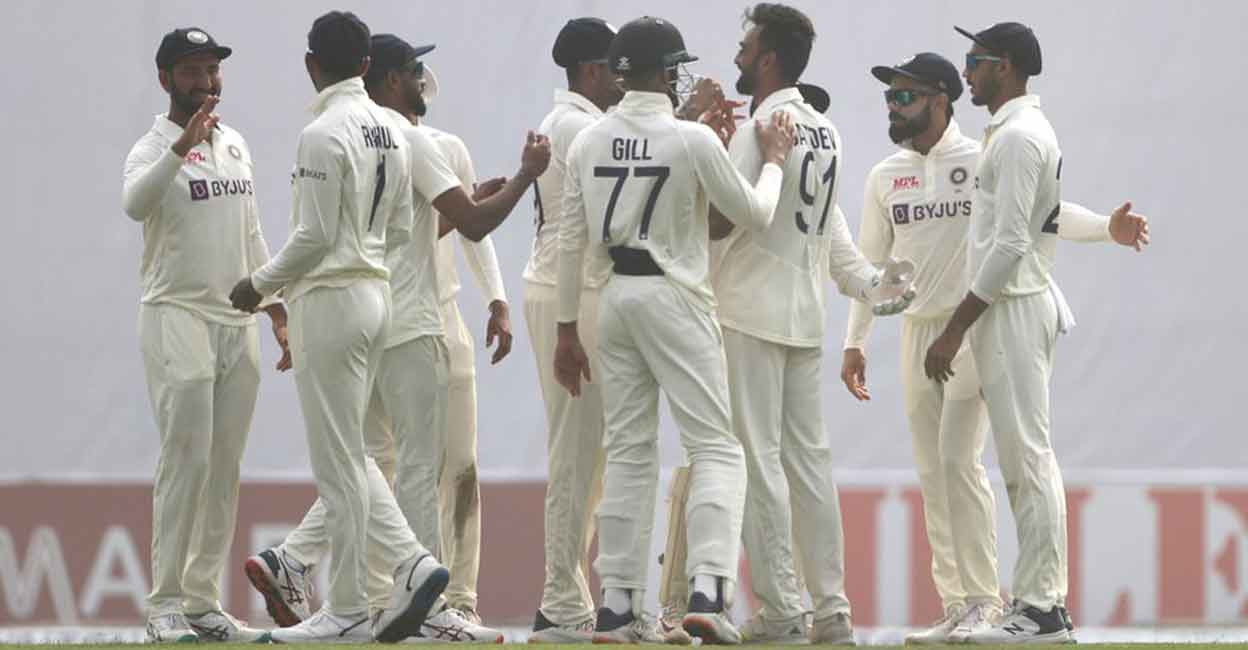 Jaydev Unadkat, third right, celebrates his maiden Test wicket. Photo: Twitter@BCCI