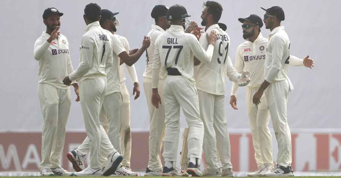 Jaydev Unadkat Jaydev Unadkat, third right, celebrates his maiden Test wicket. Photo: Twitter@BCCI