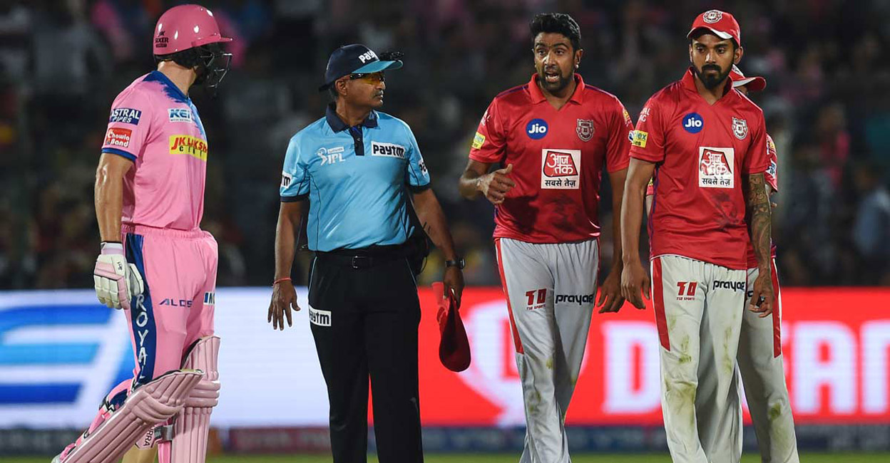 Jos Buttler, left, and R Ashwin are engaged in a heated argument after the latter Mankaded the Rajasthan Royals player in the 2019 IPL. File photo: AFP