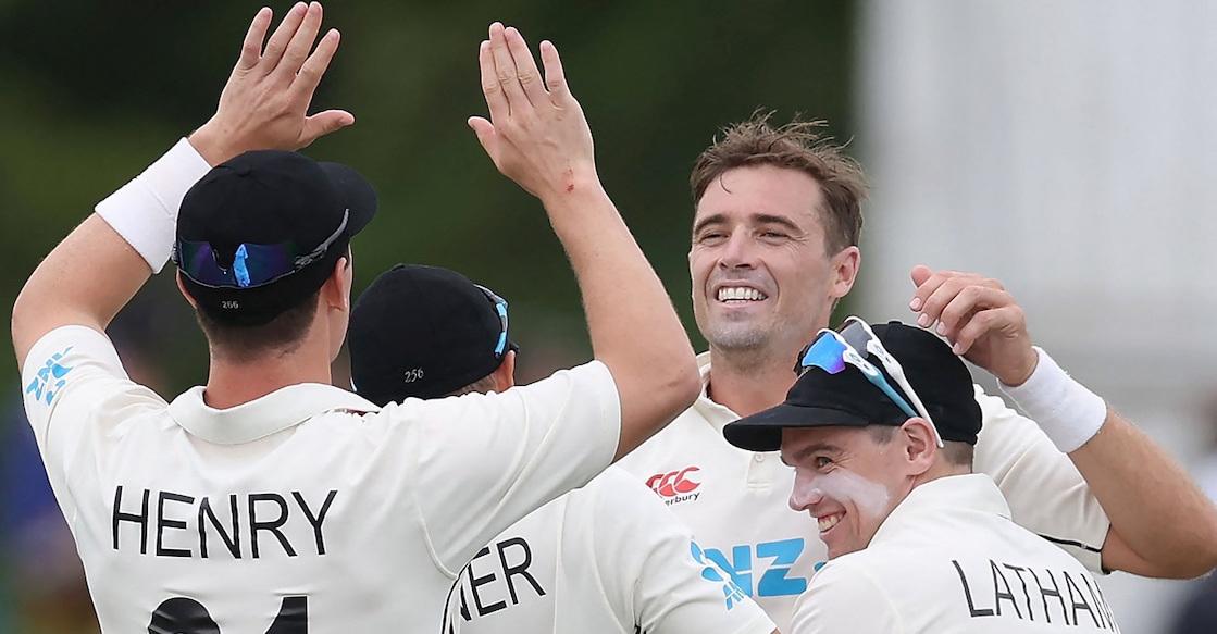 New Zealand's Tim Southee, second right, celebrates with teammates after winning the first Test. Photo: AFP/Marty Melville