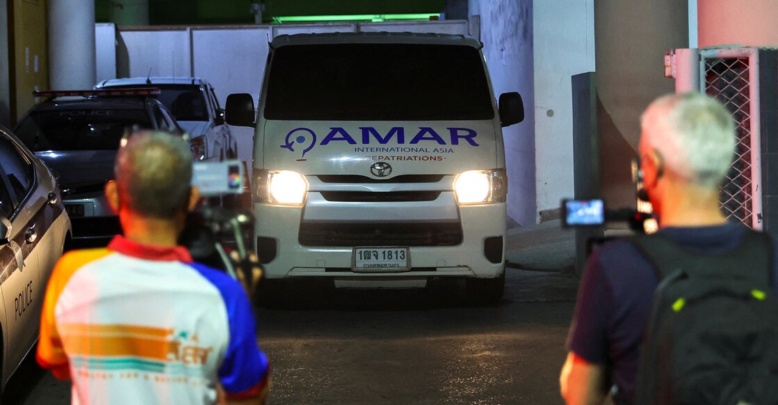 An ambulance carrying the body of Shane Warne leaves the Institute of Forensic Medicine for transfer in Bangkok, Thailand, on Thursday. Photo: Reuters/Athit Perawongmetha