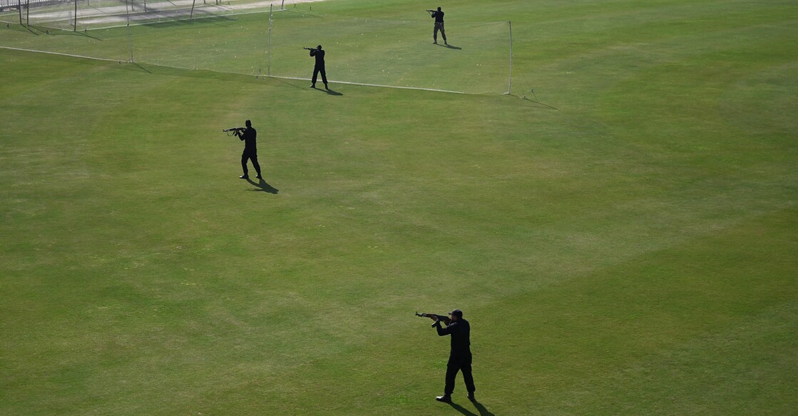 Security personnel conduct a security drill before the arrival of Pakistan and Australian teams at the Rawalpindi Cricket Stadium on March 1. File photo: AFP/Aamir Qureshi