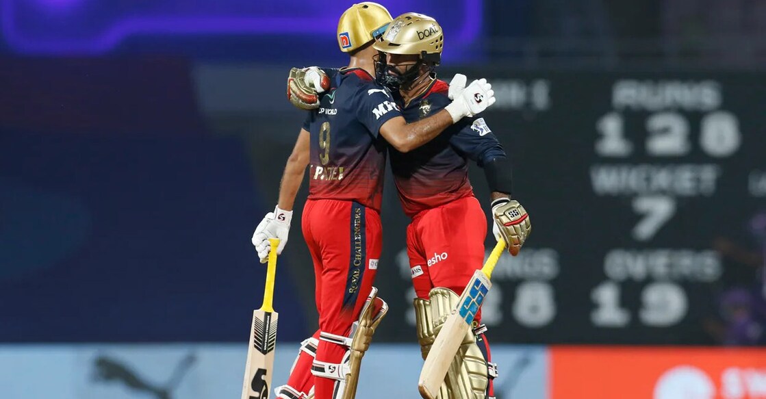 Dinesh Karthik, right, celebrates with Harshal Patel after hitting the winning shot. Photo: Twitter@Dinesh Karthik
