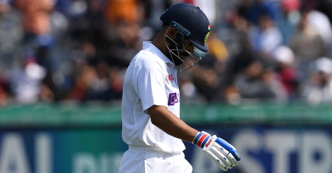 Virat Kohli A dejected Virat Kohli returns to the pavilion. Photo: AFP/ Prakash Singh