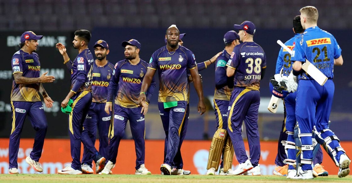 Kolkata Knight Riders and Mumbai Indians players greet each other after the end of their Indian Premier League 2022 cricket match, at the DY Patil Stadium in Mumbai, Monday, May 9, 2022. Kolkata Knight Riders won the match by 52 runs. PHOTO: PTI