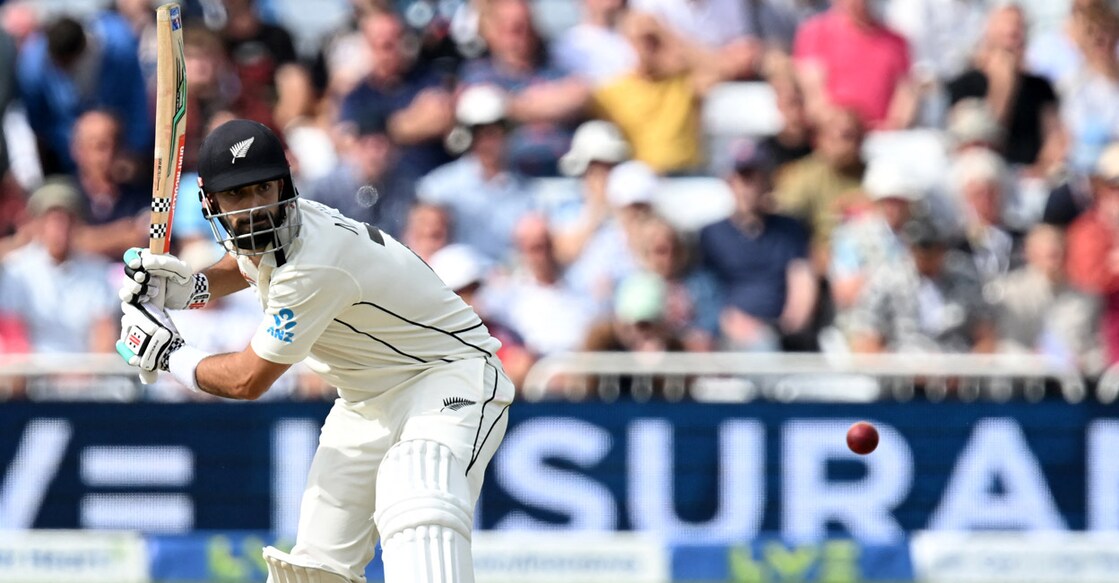 Daryl Mitchell scored an unbeaten 81 as New Zealand cruised to 318/4 from 87 overs at the end of the opening day. Photo: AFP/Paul Ellis