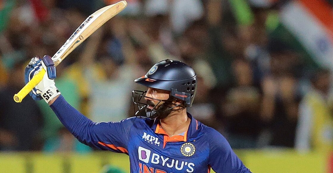 Dinesh Karthik celebrates his fifty in the fourth T20I at Rajkot. File photo: IANS