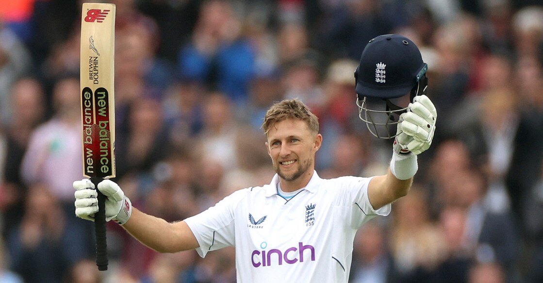 Joe Root celebrates his century. Photo: Action Images via Reuters/Paul Childs