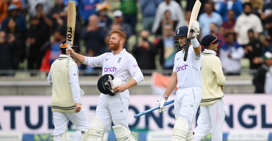 Jonny Bairstow and Joe Root celebrate England's win. Photo: Twitter@ICC