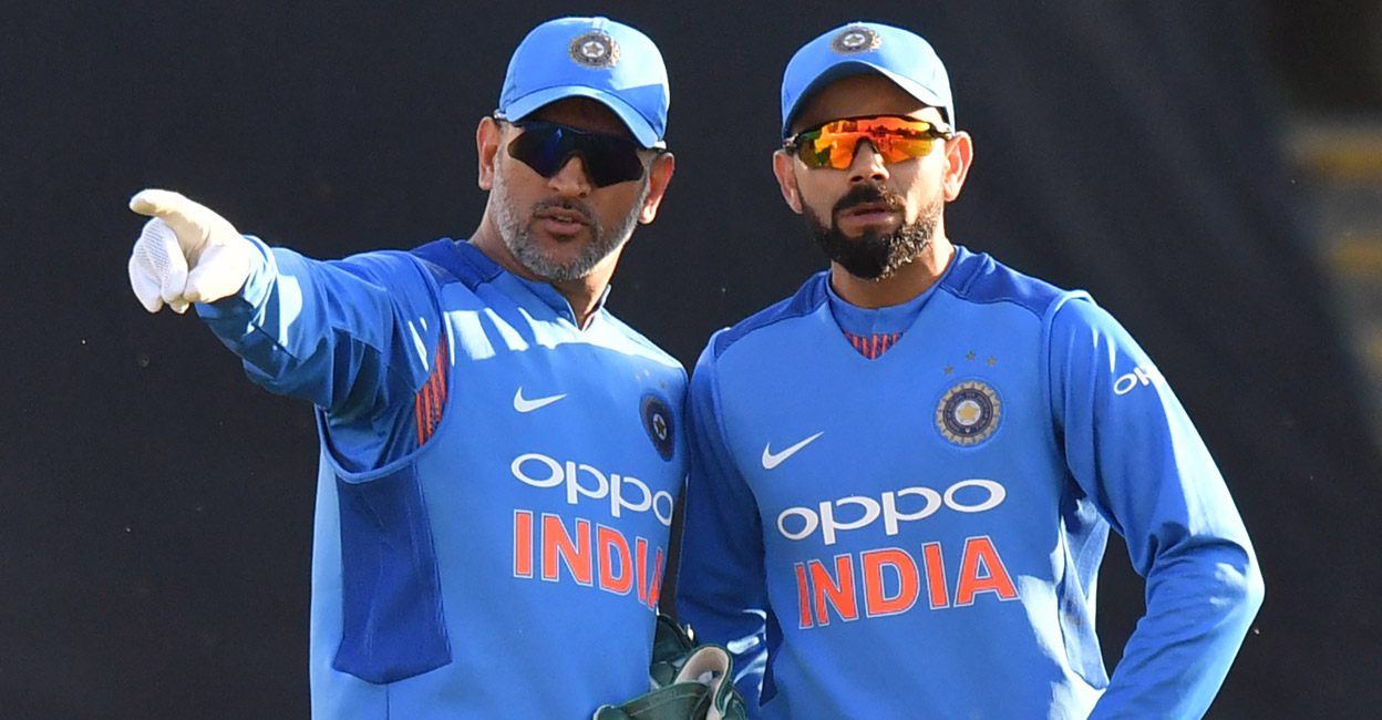 M S Dhoni and Virat Kohli have great respect for each other. File photo: AFP/Anthony Devlin