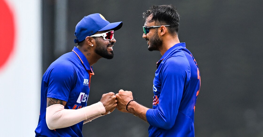 Hardik Pandya and Axar Patel Hardik Pandya and Axar Patel celebrate the fall of a West Indies batter. Photo: AFP/Chandan Khanna