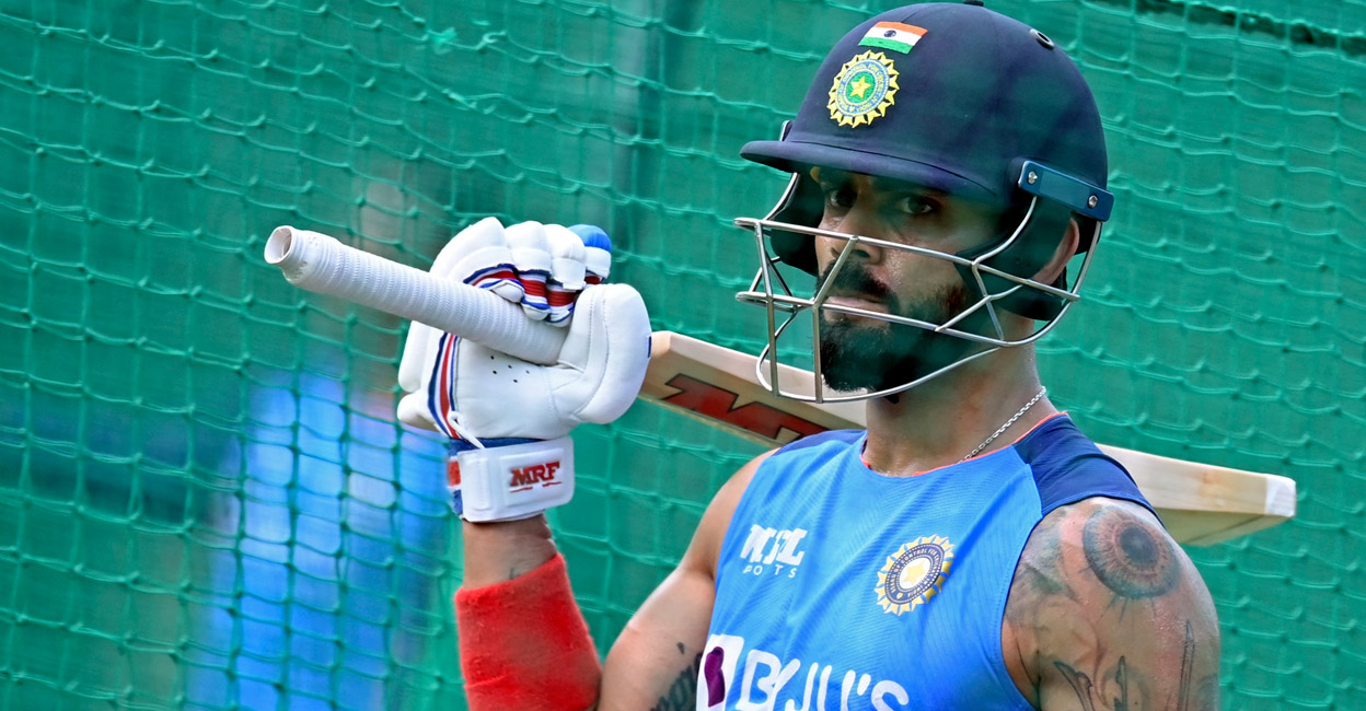 Virat Kohli at the nets during a practice session in Mohali on Sunday. Photo: AFP/Sajjad Hussain