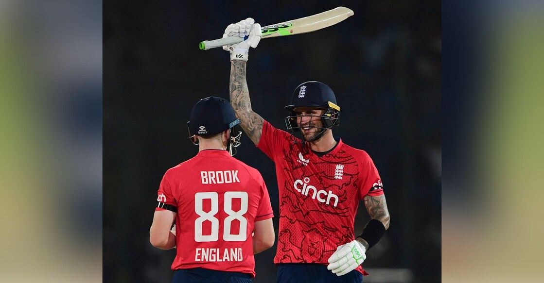 England's Alex Hales (right) celebrates after scoring a half century during the first T20I against Pakistan at the National Cricket Stadium in Karachi on Tuesday. Photo: AFP/ Asif Hassan