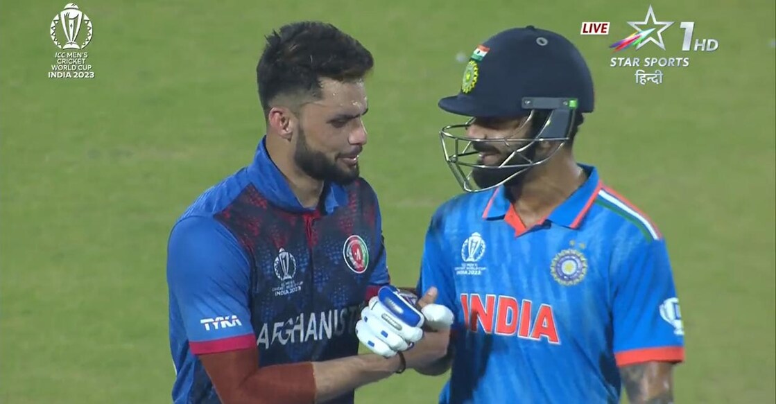  Kohli, right, involved in a banter with Naveen. Screengrab
