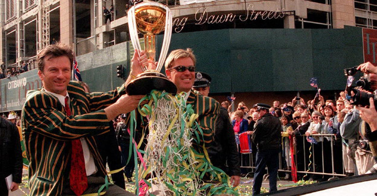 Steve Waugh & Shane Warne Steve Waugh and Shane Warne hold aloft the World Cup trophy during a victory parade in Sydney on June 28, 1999. File photo: AFP/Gabrielle Charotte