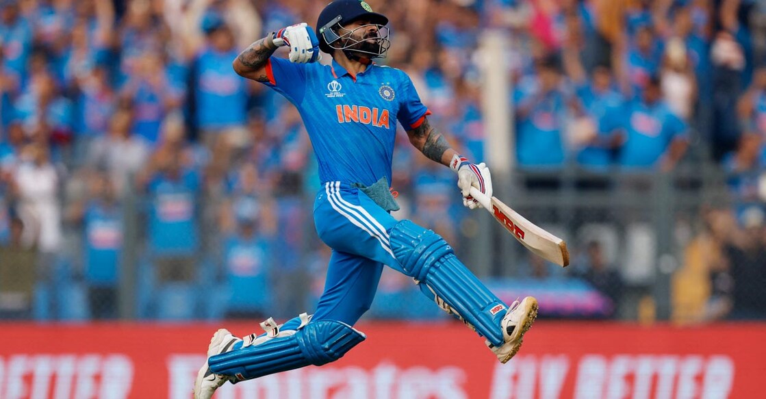 Virat Kohli celebrates his century. Photo: Reuters/Adnan Abidi