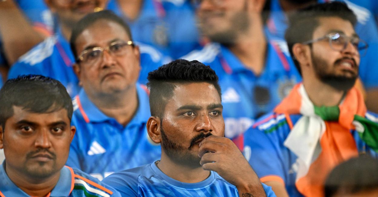 Concerned faces Dejected Indian fans during the World Cup final. File photo: AFP/Money Sharma
