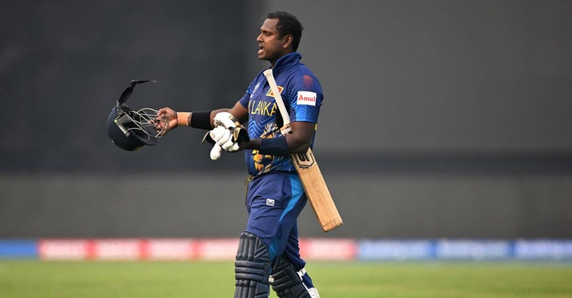 Sri Lanka's Angelo Mathews walks back to the pavilion after he was timed out during the 2023 ICC Men's Cricket World Cup one-day international (ODI) match in New Delhi. Photo: AFP/ Arun Sankar