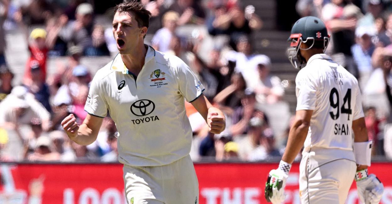 Australian captain Pat Cummins celebrates dismissing his Pakistani counterpart Shan Masood. Photo: AFP/William West