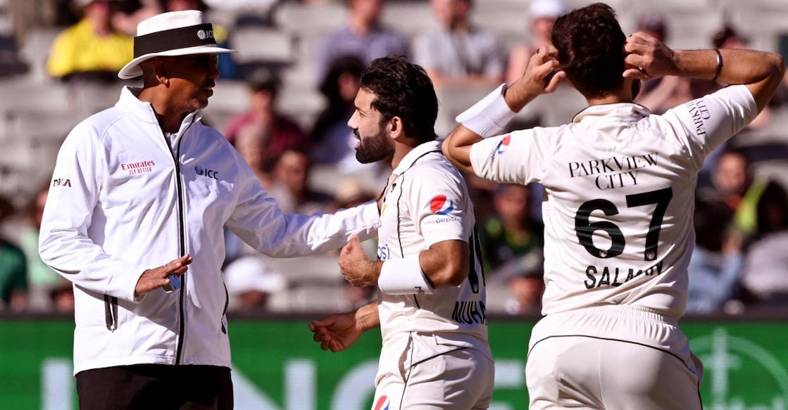 Mohammad Rizwan argues with umpire Joel Wilson following his dismissal. Photo: AFP/William West
