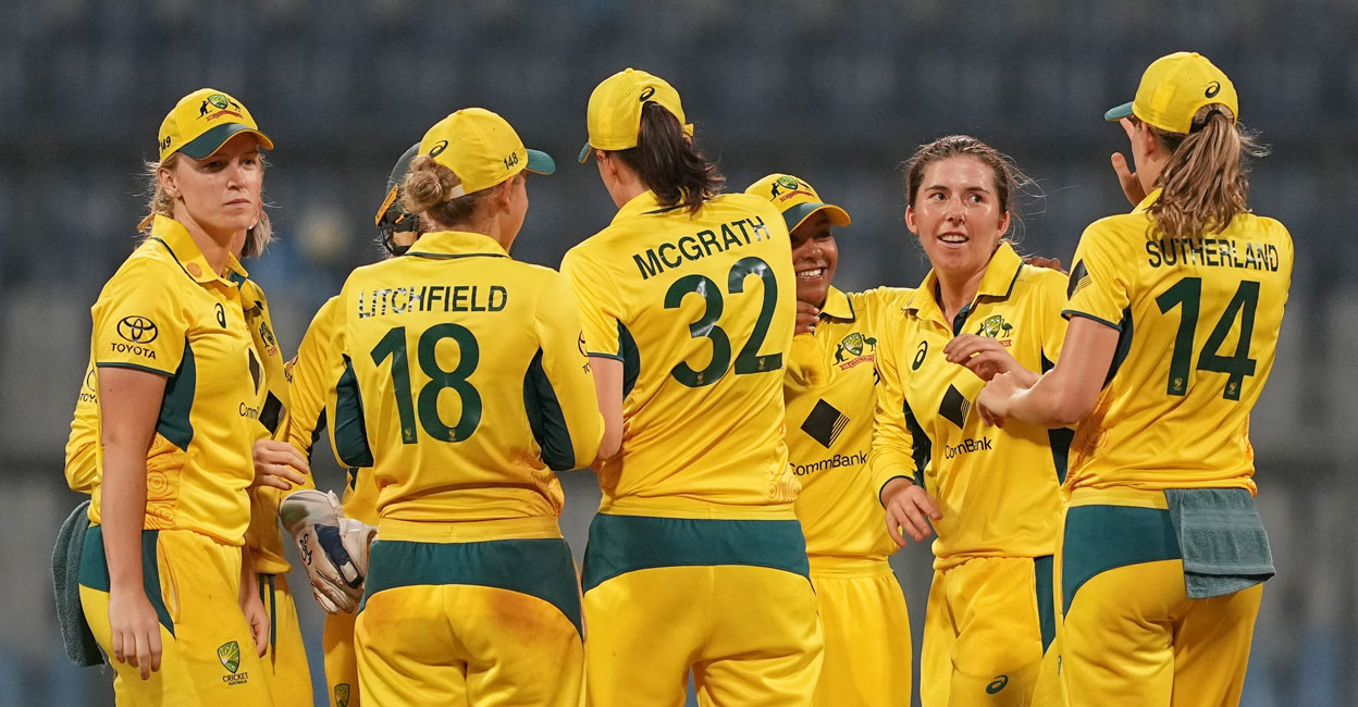 Australian players celebrate the wicket of India's Harmanpreet Kaur during the second ODI at the Wankhede Stadium in Mumbai on Saturday. Photo: PTI