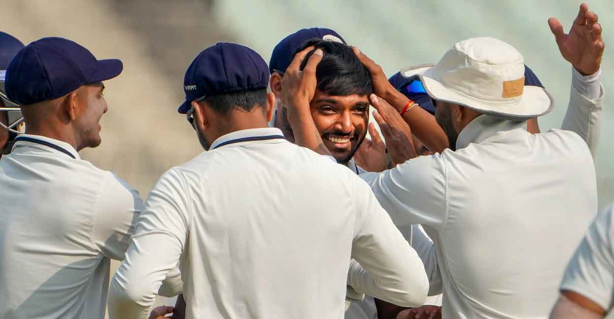 Chetan Sakariya Saurashtra bowler Chetan Sakariya being greeted by his teammates after dismissing Sudip Kumar Gharami. Photo: PTI/Swapan Mahapatra