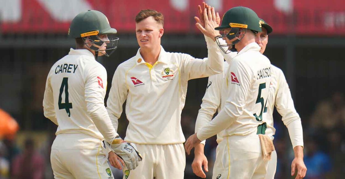 Matthew Kuhnemann, second left, celebrates with teammates after sending back Shreyas Iyer. Photo: PTI: Ravi Choudhary