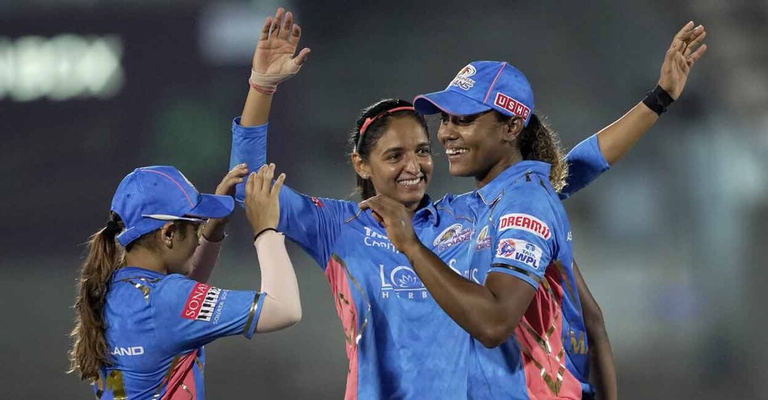 Mumbai Indians' Hayley Matthews celebrates the wicket of Gujurat Giants Tanuja Kanwar with teammates during the Women's Premier League T20 cricket match at Brabourne Stadium in Mumbai on Tuesday. Photo: PTI