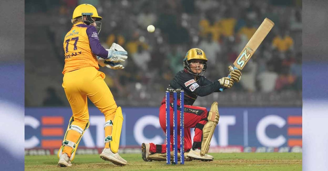 Royal Challengers Bangalore player Kanika Abuja plays a shot during the Women's Premier League (WPL) match against UP Warriorz in Navi Mumbai on Wednesday. Photo: PTI