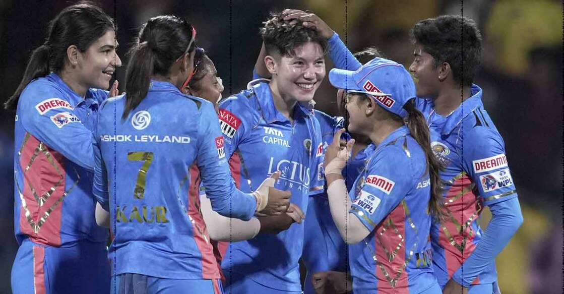 Mumbai Indians' Issy Wong with teammates celebrates the wicket of UP Warriorz' Sophie Ecclestone during the 2023 Women's Premier League Eliminator at DY Patil Stadium in Navi Mumbai on Friday. Photo: PTI