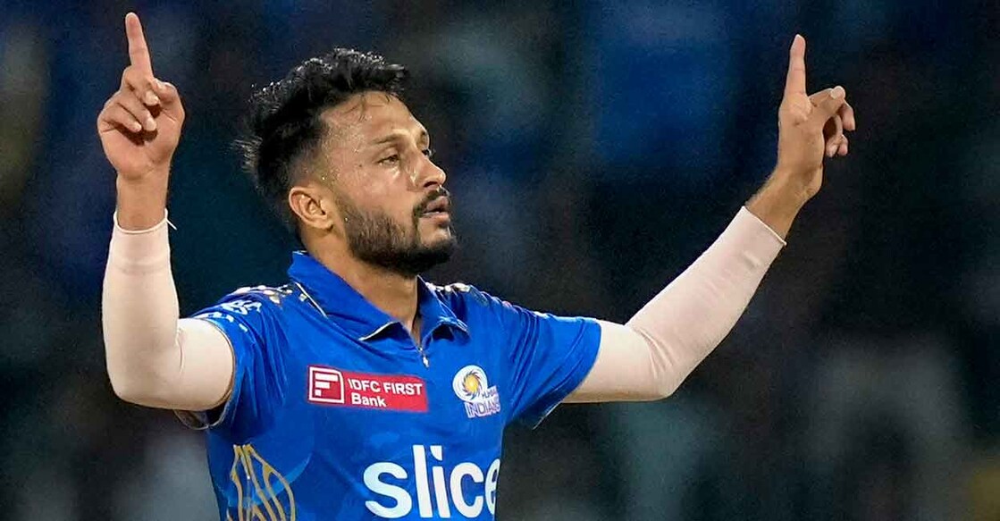 Akash Madhwal exults after picking up a wicket against LSG. Photo: PTI/R Senthil Kumar