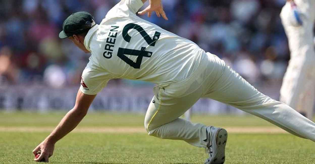 Green pulls off a superb catch to cut short Gill's stint. Photo: IANS