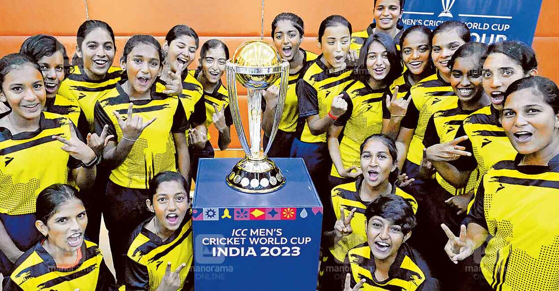 Members of the Ernakulam district U-15 and U-19 women's teams pose with the trophy. Photo: Manorama 