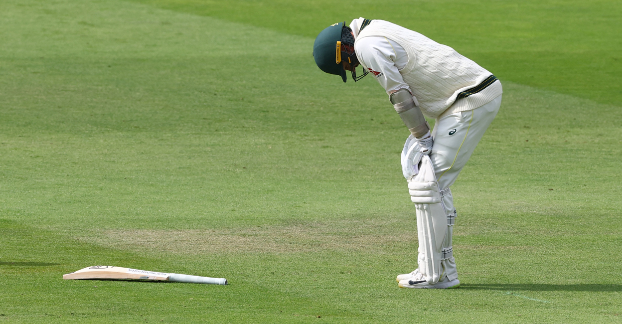 Nathan Lyon reacts as he struggles with his injury. Photo: Action Images via Reuters/Matthew Childs