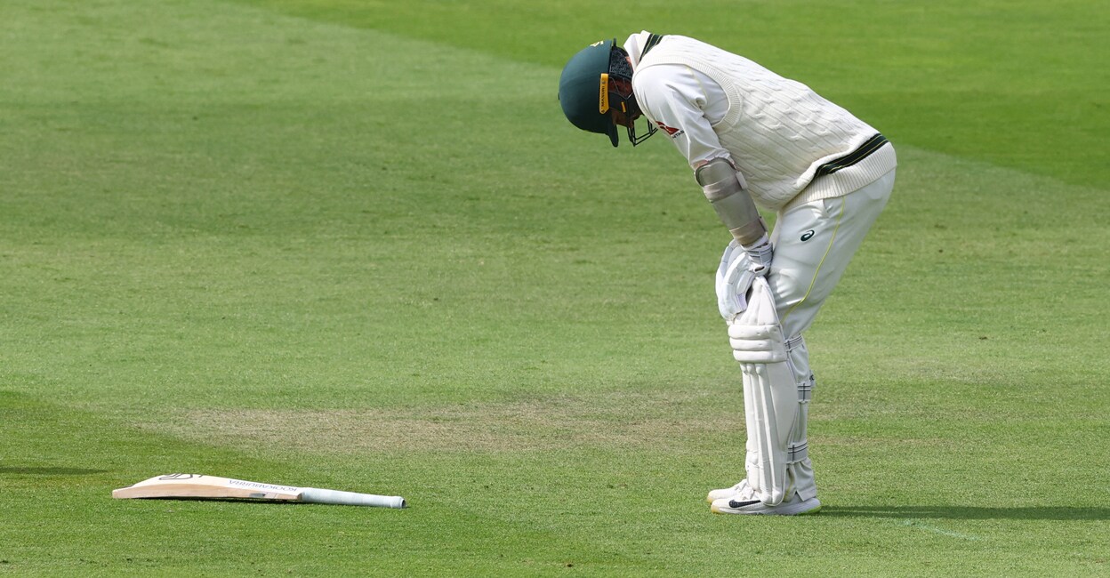 Nathan Lyon reacts as he struggles with his injury. Photo: Action Images via Reuters/Matthew Childs