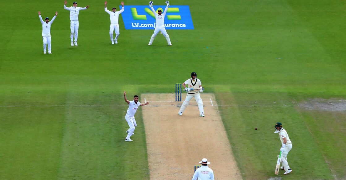 England's Mark Wood appeals successfully for the lbw wicket of Australia's Steve Smith Action Images via Reuters/Andrew Boyers