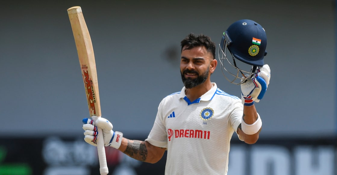 Virat Kohli of India celebrates his century during the second day of the second Test against West Indies at Queen's Park Oval in Port of Spain, Trinidad and Tobago on Friday. Photo: AFP/Randy Brooks