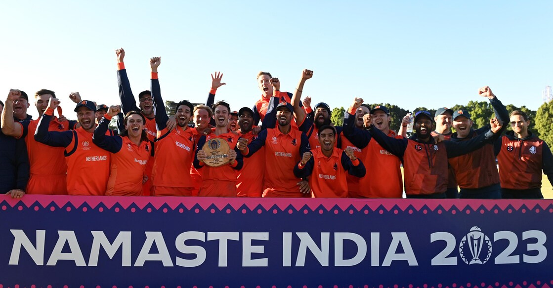 Netherlands players celebrate their qualification. Photo: Twitter/@ICC