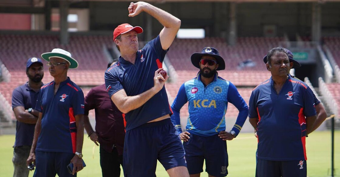 Glenn McGrath offers tips to the young fast bowlers. Photo: Special Arrangement