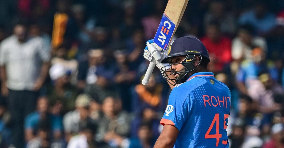 Rohit Sharma celebrates his fifty. Photo: AFP/Ishara S Kodikara