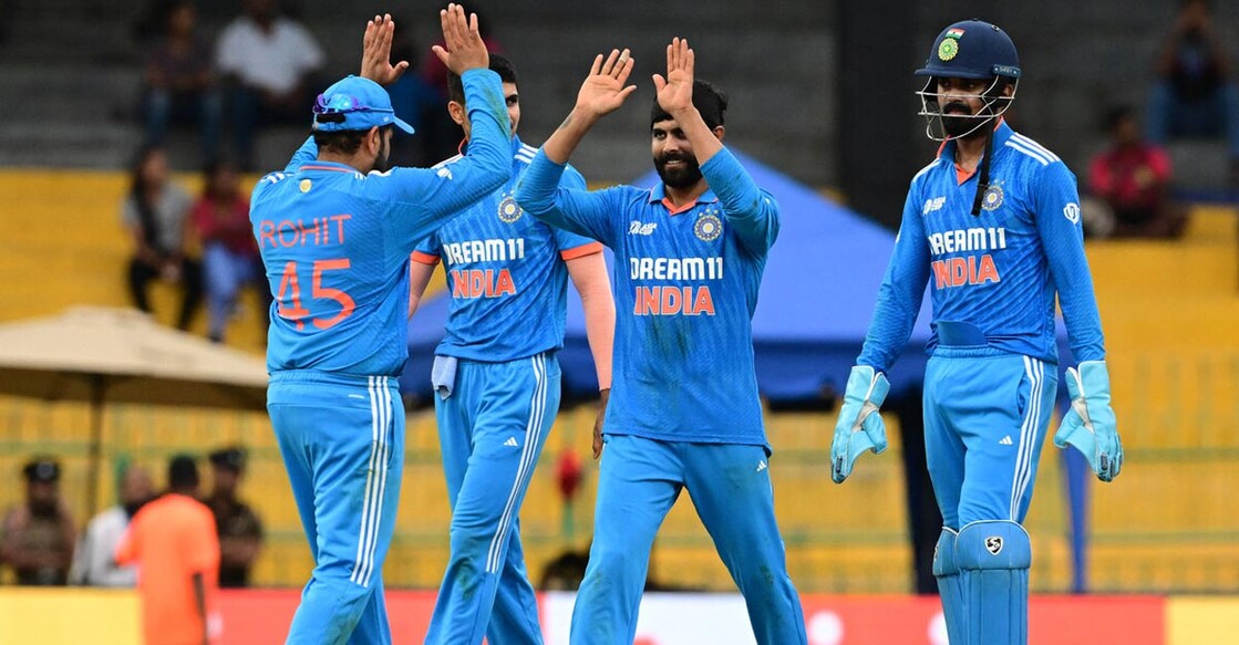 Jadeja, third left, is the seventh Indian to claim 200 ODI wickets. Photo: AFP/Ishara S Kodikara