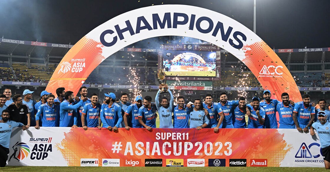 India’s players and team members celebrate with the trophy after winning the Asia Cup 2023 ODI final cricket match between India and Sri Lanka. Photo: FAROOQ NAEEM / AFP