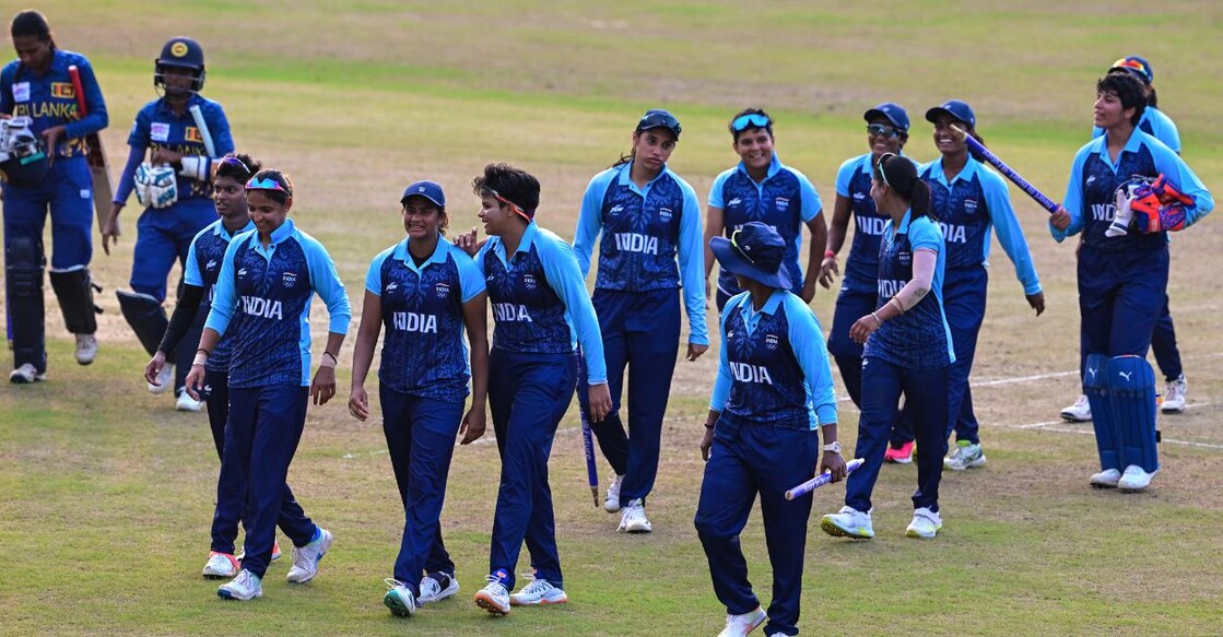 India's players celebrate their victory at the end of the 2022 Asian Games women's final cricket match between Sri Lanka and India in Hangzhou in China's eastern Zhejiang province on September 25, 2023. Photo: Ishara S Kodikara/AFP
