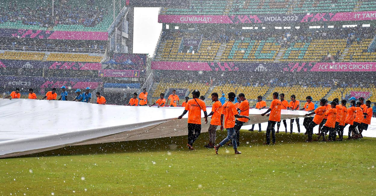 Rain plays spoilsport Covers placed on the pitch as it rains. Photo: PTI